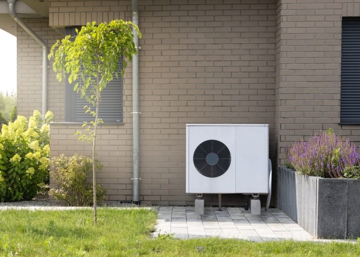 Heat,Pump,System,Installed,On,Modern,Building,Exterior
