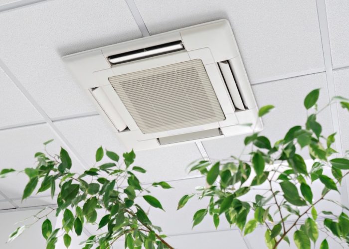 Cassette,Air,Conditioner,On,Ceiling,In,Modern,Light,Office,Or